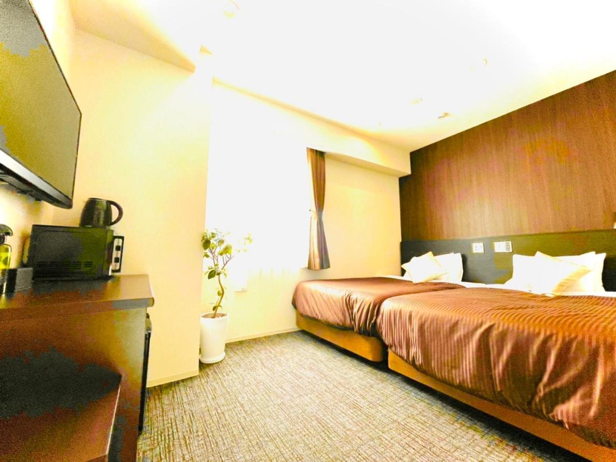 Natural Hot Spring Hotel Livemax Premium Hiroshima Exterior foto